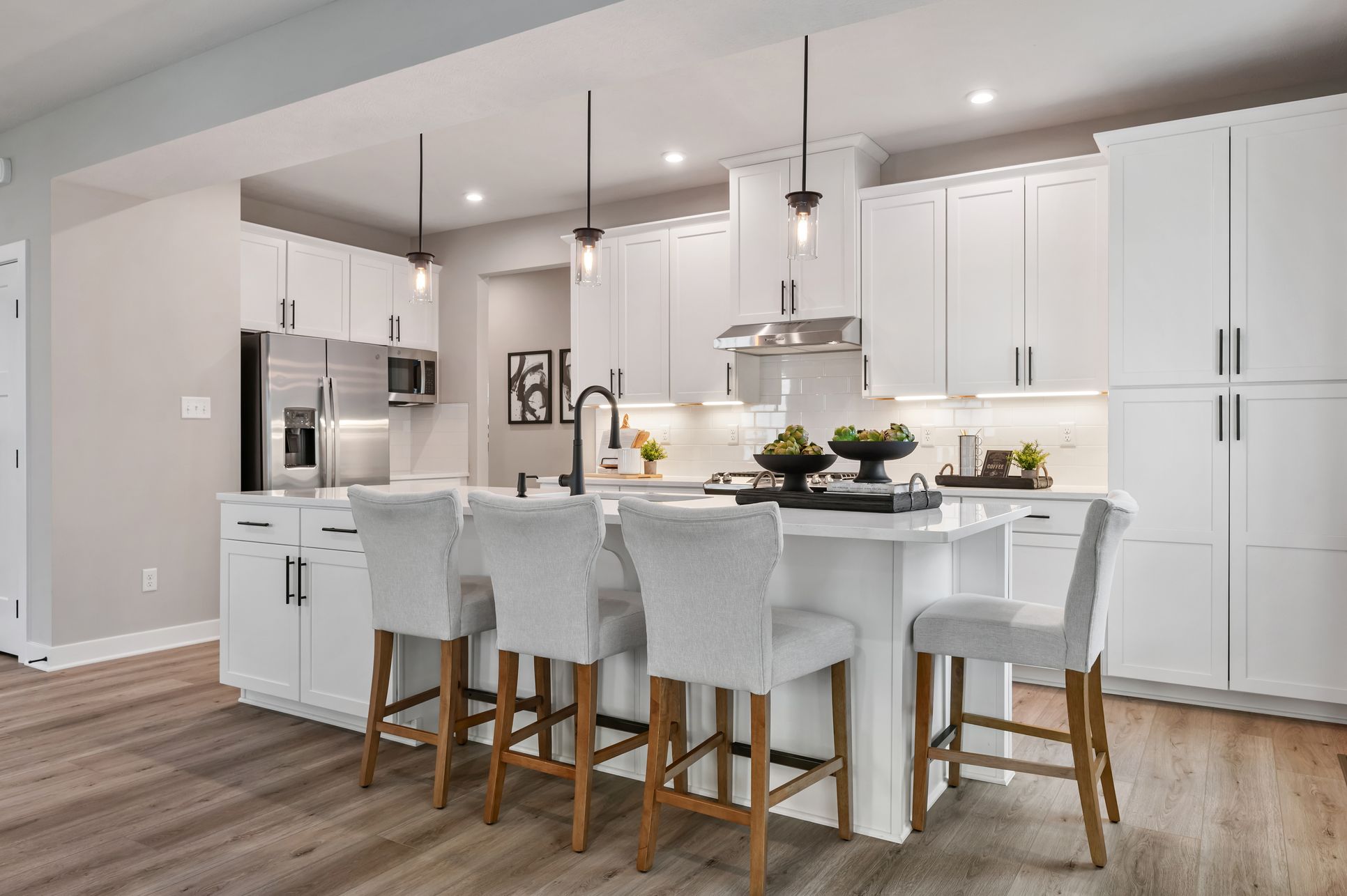 Your dream kitchen awaits - oversized island, modern finishes, and open views