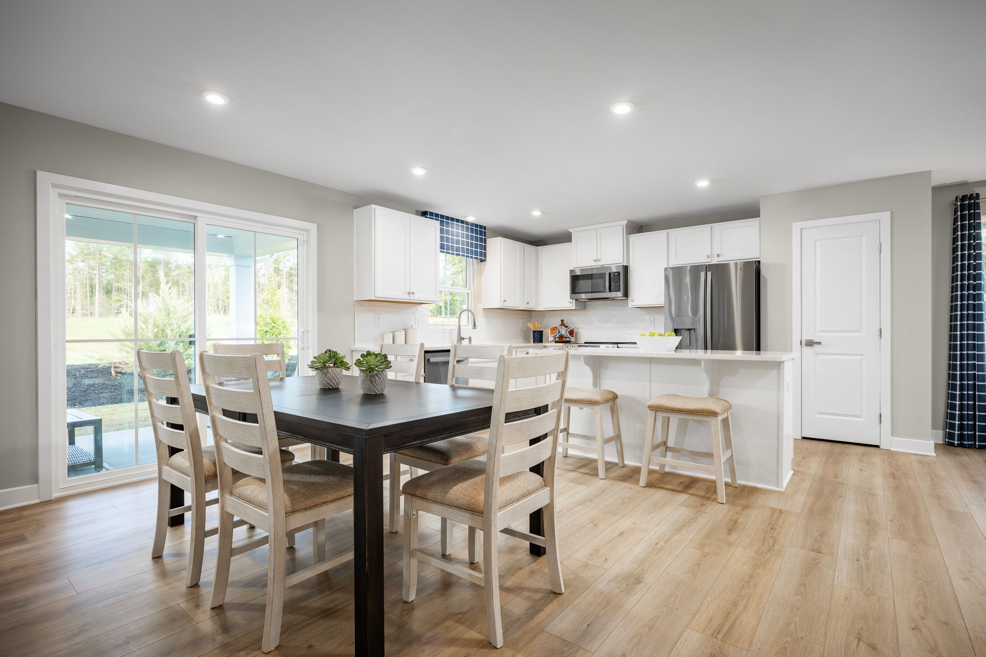 Stylish kitchens with your choice of finishes and included GE stainless steel appliances.:Schedule a Visit to learn more!