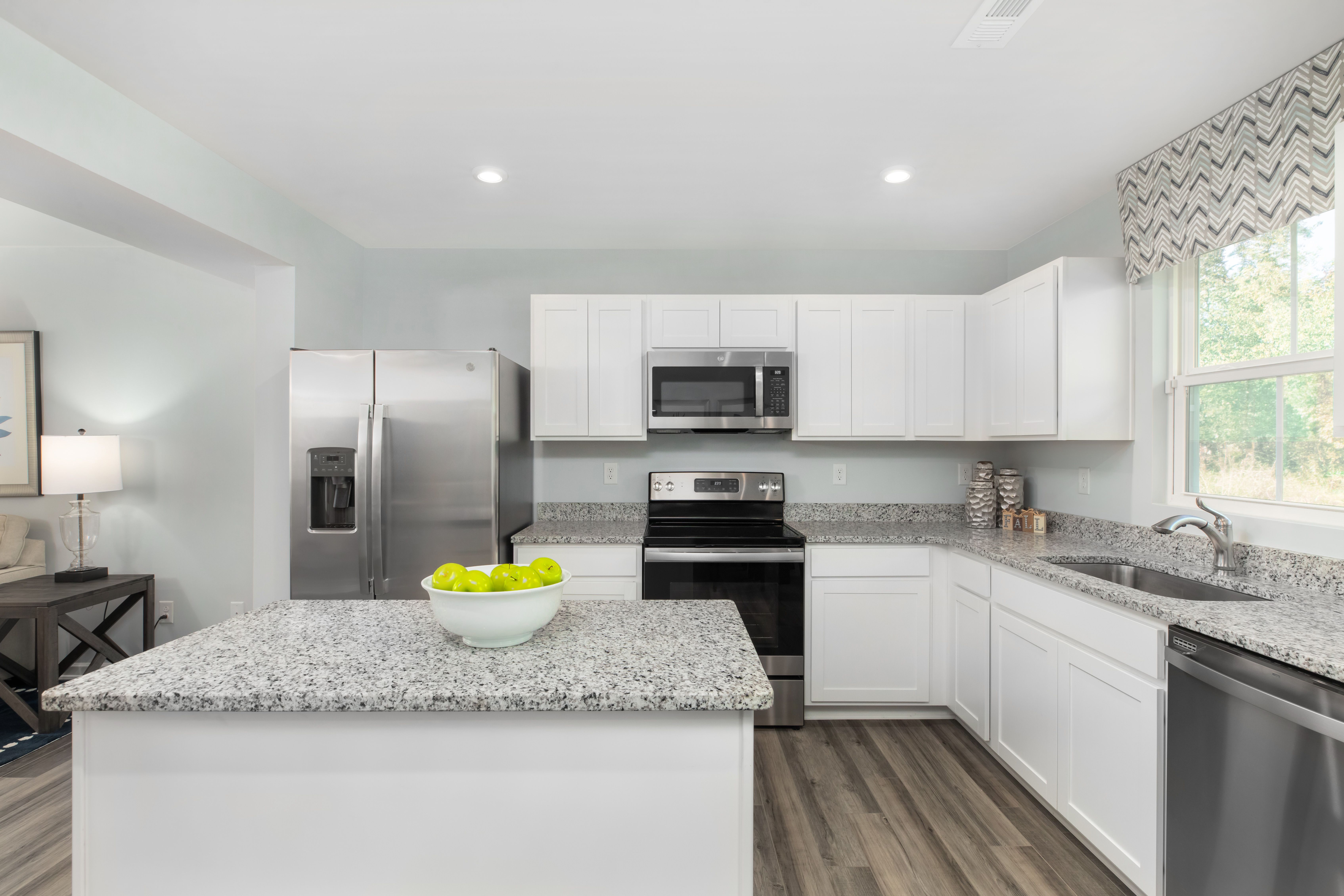 Lowest priced garage townhomes in a premier Raleigh location with lawn care included.:Stop renting and invest in your future at Rollman Farms. Where lifestyle meets location. Now Selling in a premier Raleigh location. Schedule your private tour today!