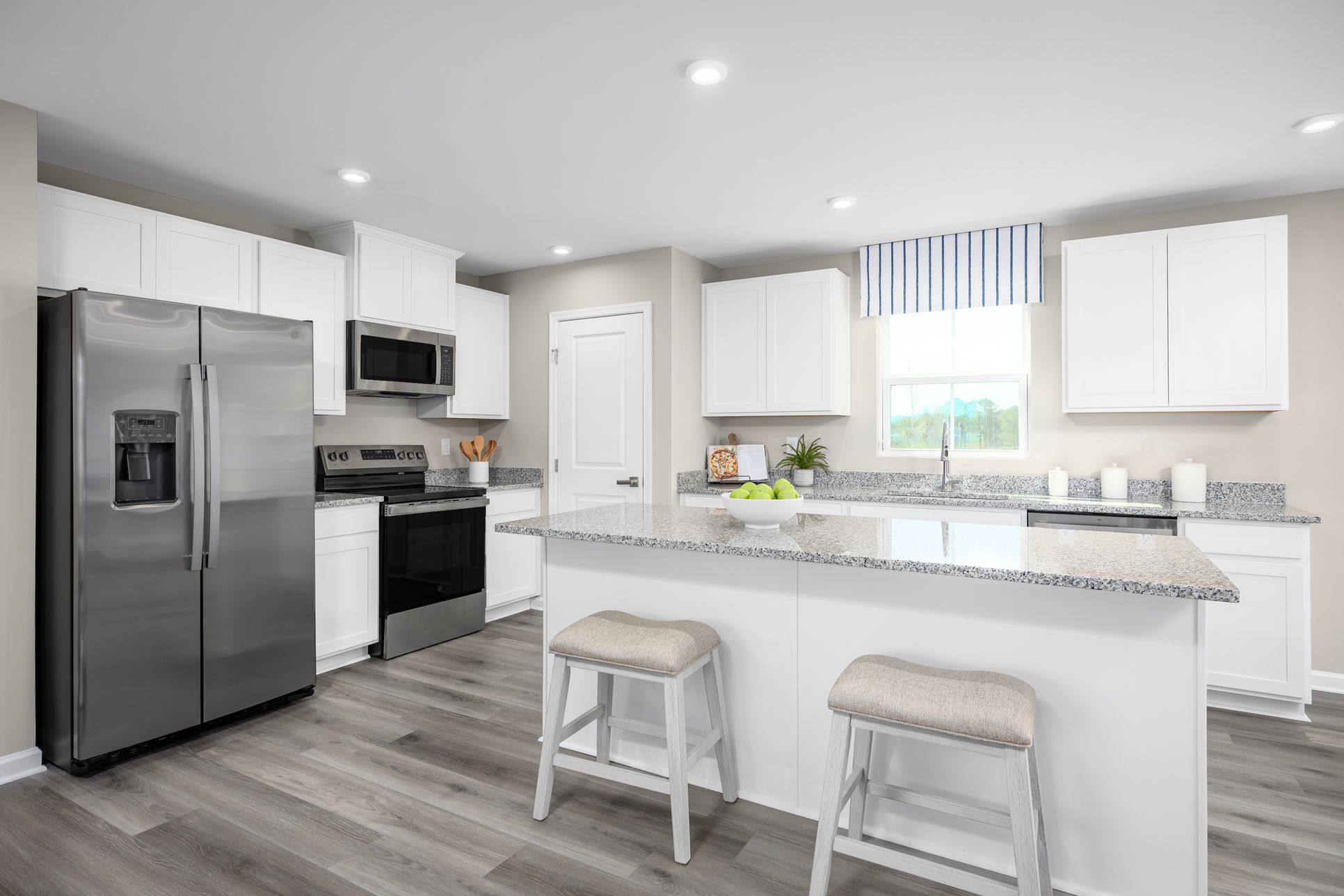 Now Open! Explore open-concept floor plans with popular features like a kitchen island and pantry.