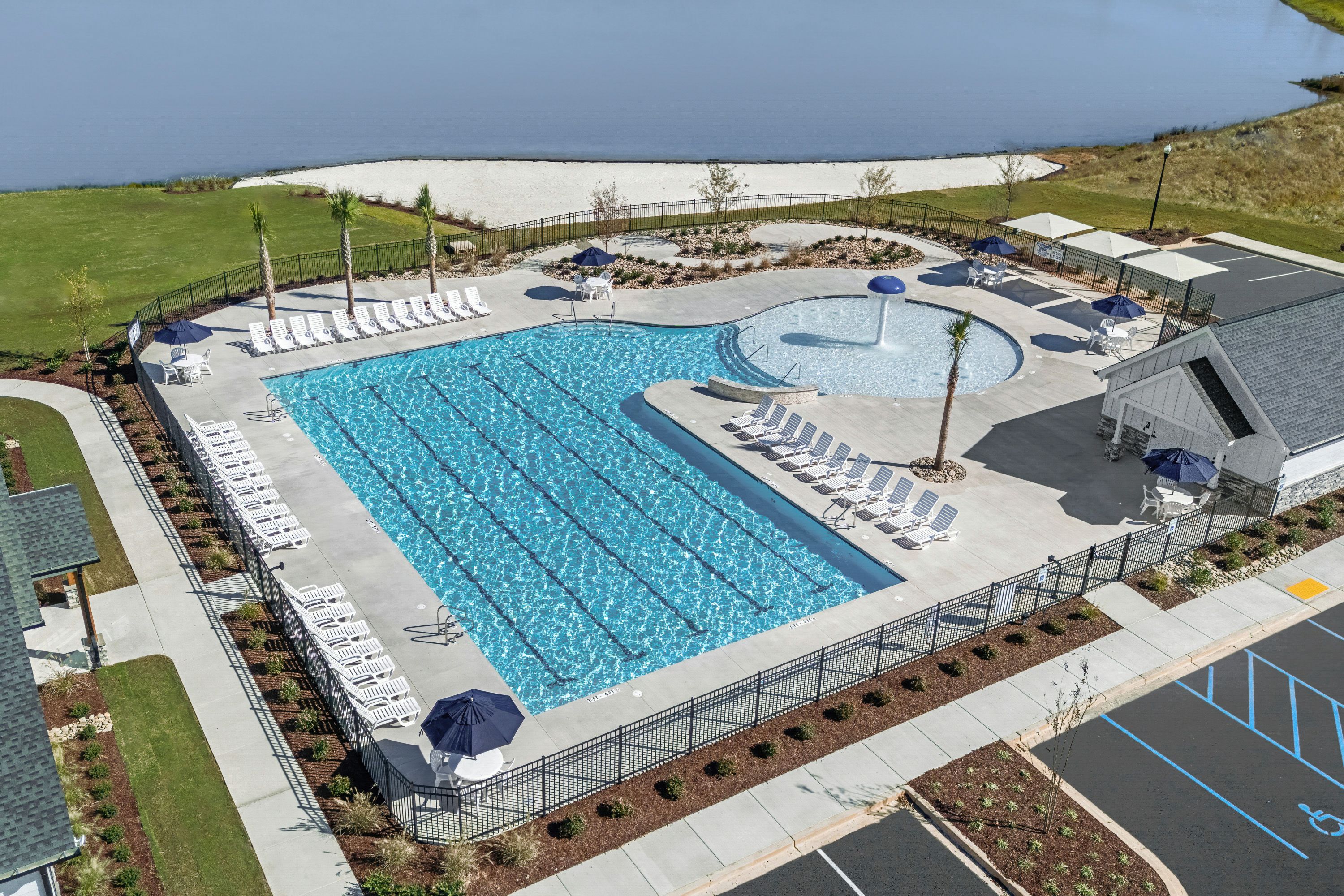 Enjoy resort-style living at Everly with pools, gyms, trails, a lake & more!