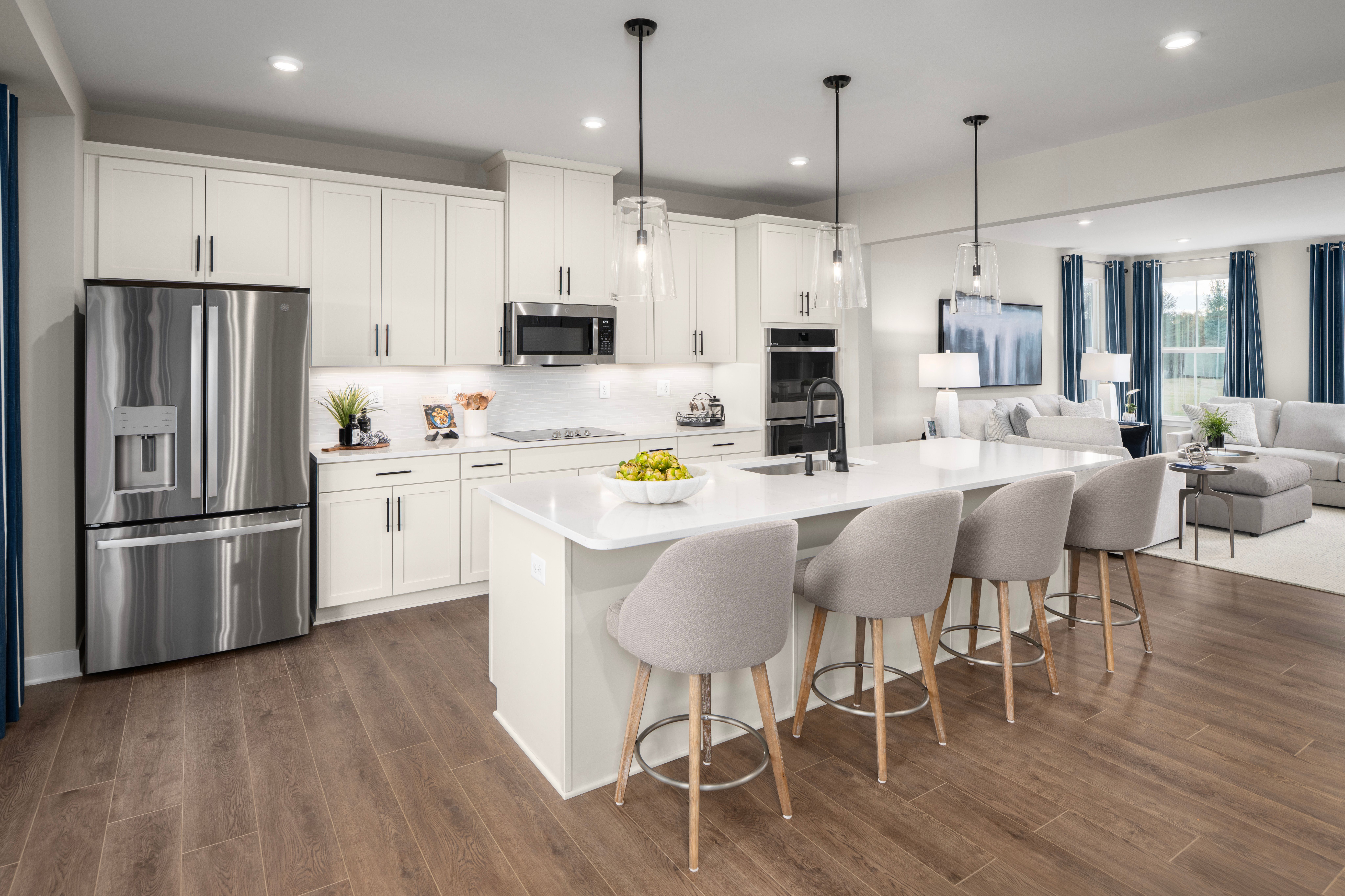 Luxury features included: gourmet kitchen, quartz, hard surface floors & 2-car garage.