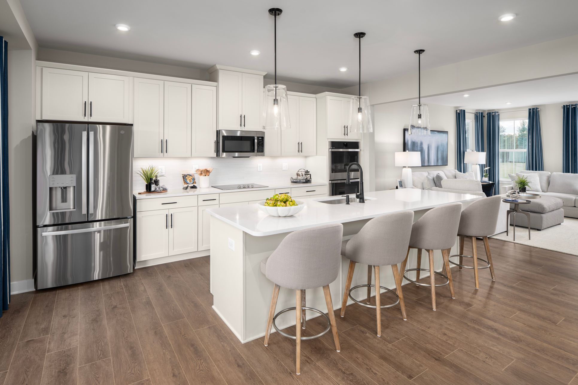 Luxury features included: slide in range, quartz, hard surface floors, french door fridge and more!