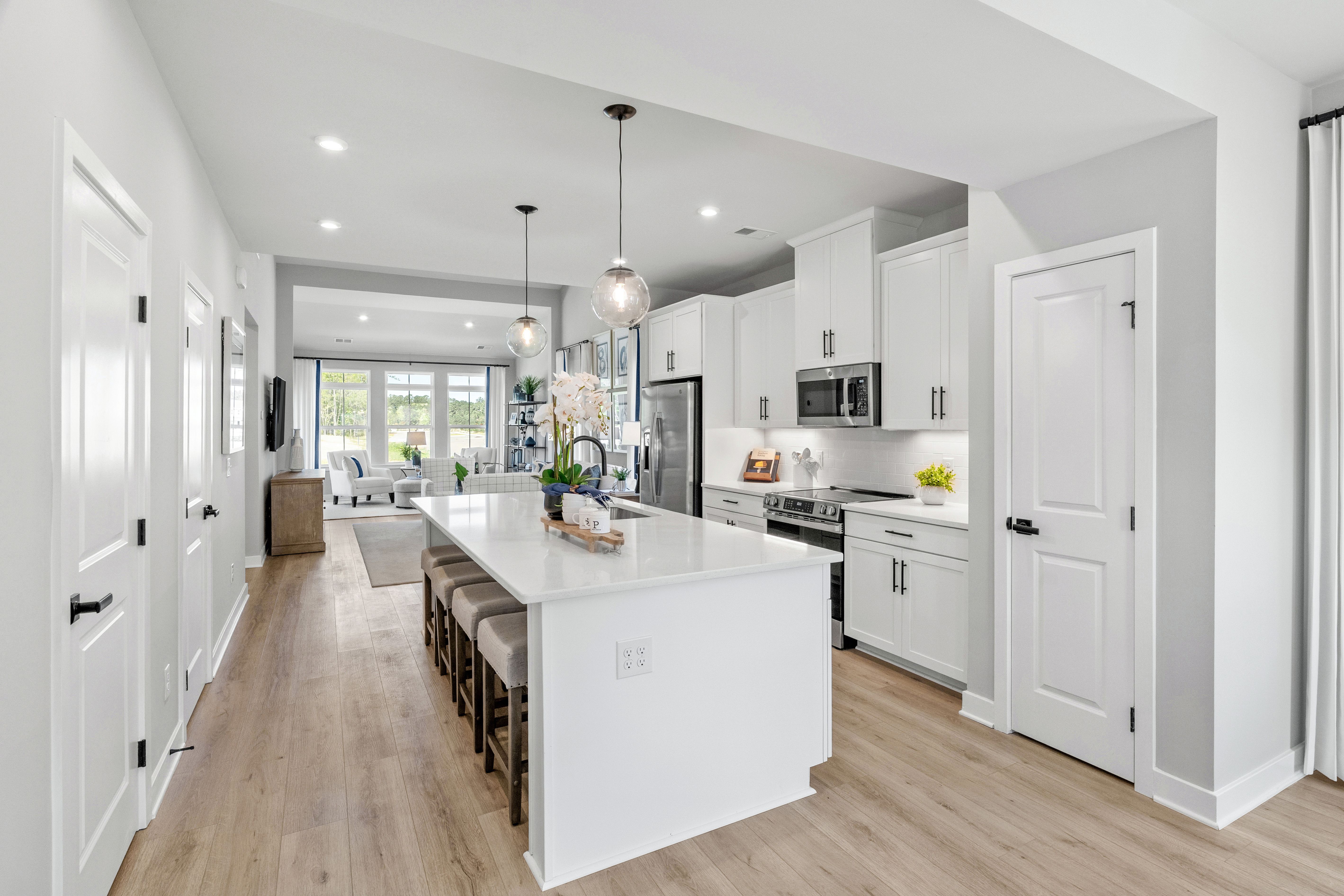 Experience the luxury of main-level living in our two-story homes, each offering stunning views. Schedule a visit today to explore our model home.