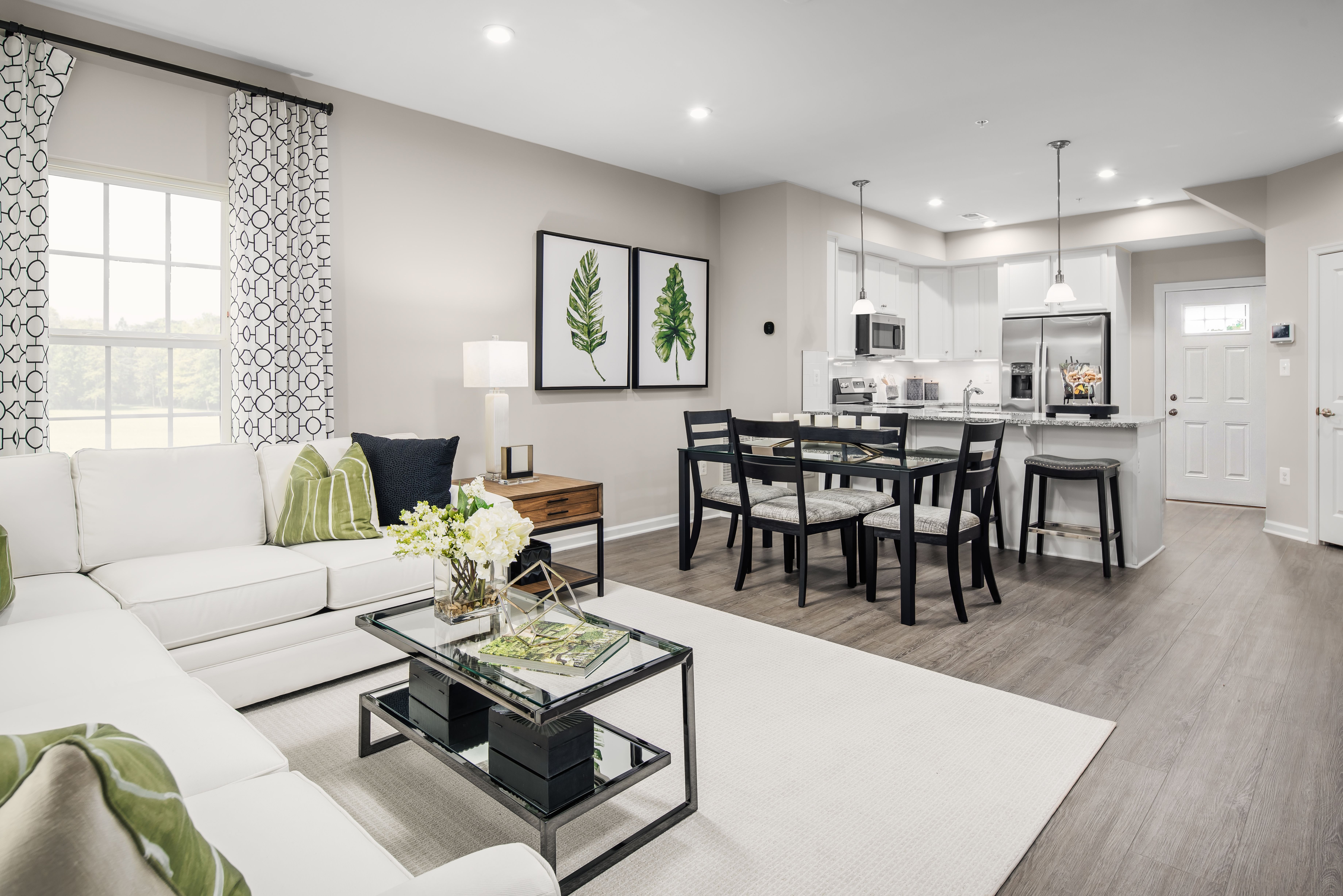 Bright, open layouts designed for entertaining or relaxing in comfort.:No matter which floorplan you choose - our townhome-style condos are designed with you in mind. The bright, open floorplans are perfect for entertaining, or binge watching your favorite show!