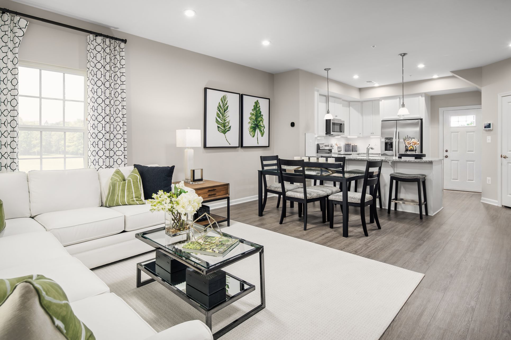 Bright, open layouts designed for entertaining or relaxing in comfort.:No matter which floorplan you choose - our townhome-style condos are designed with you in mind. The bright, open floorplans are perfect for entertaining, or binge watching your favorite show!