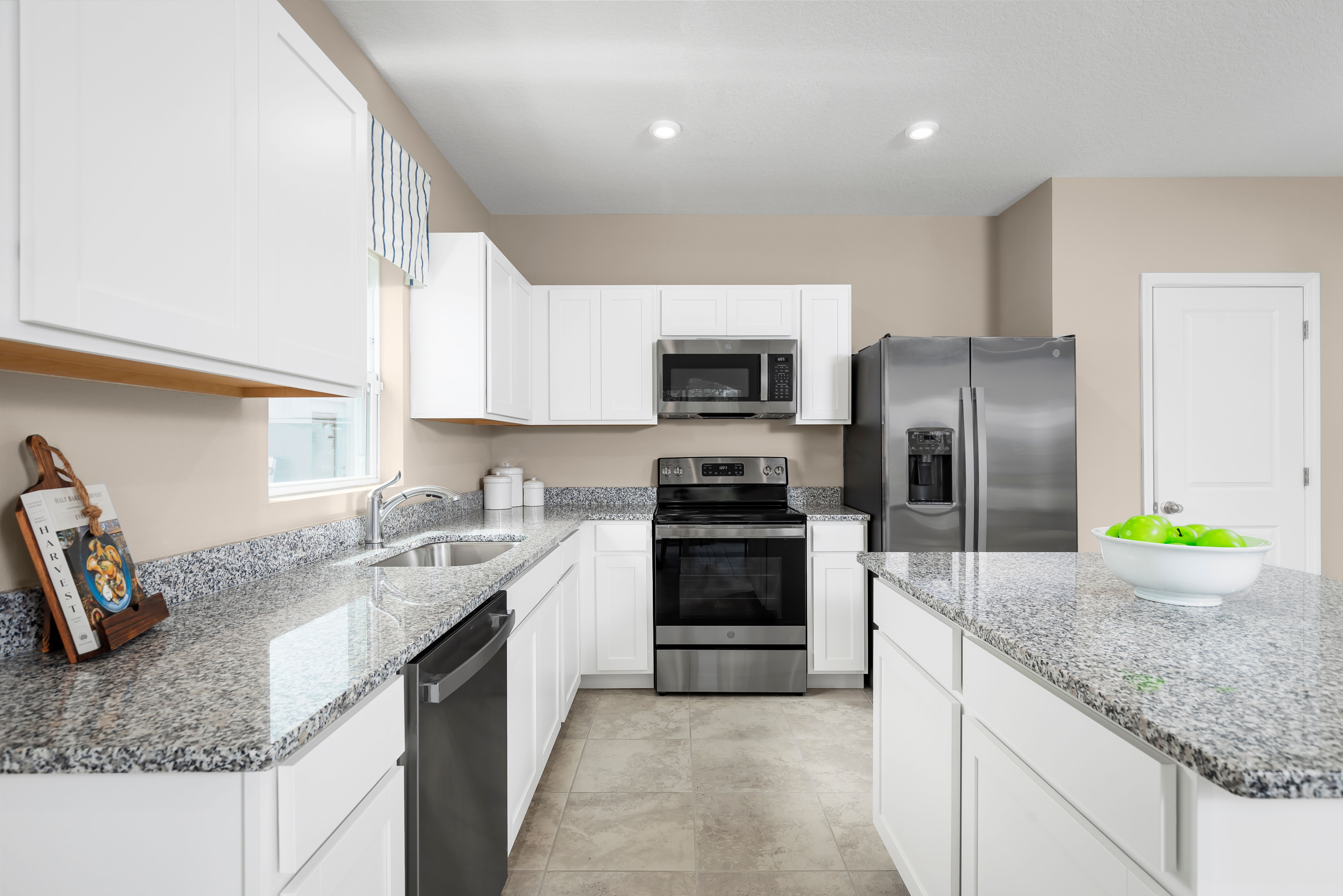 Enjoy included luxury finishes such as granite countertops and a natural gas stove.:Personalize your space effortlessly&mdash;choose cabinets, countertops, and interior finishes that match your style. We include luxury features like granite and natural gas.