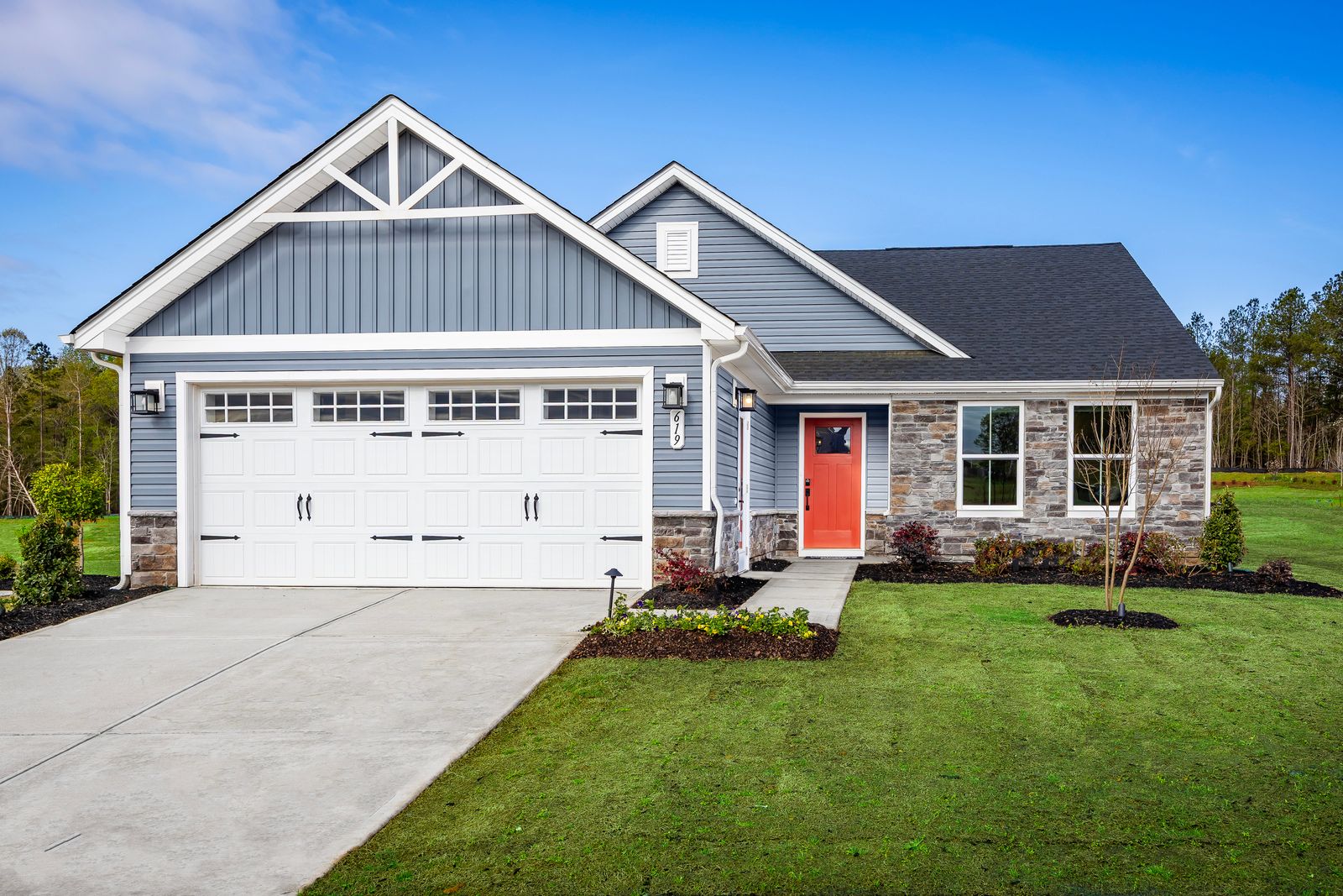 Own a one-level home in Woodruff with lawncare, pool, and trails included!