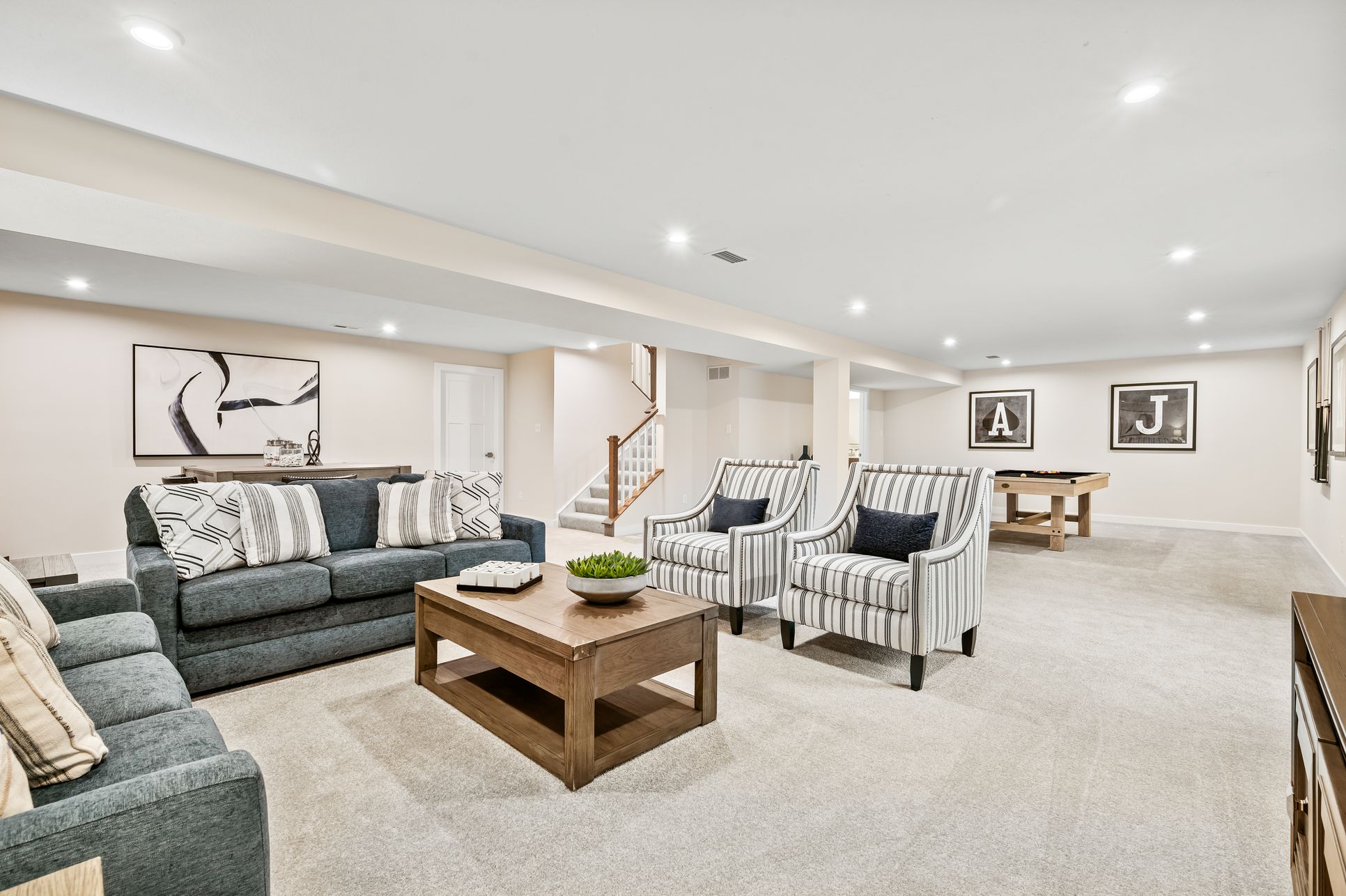 A beautifully finished lower level designed for gracious entertaining and effortless relaxation.