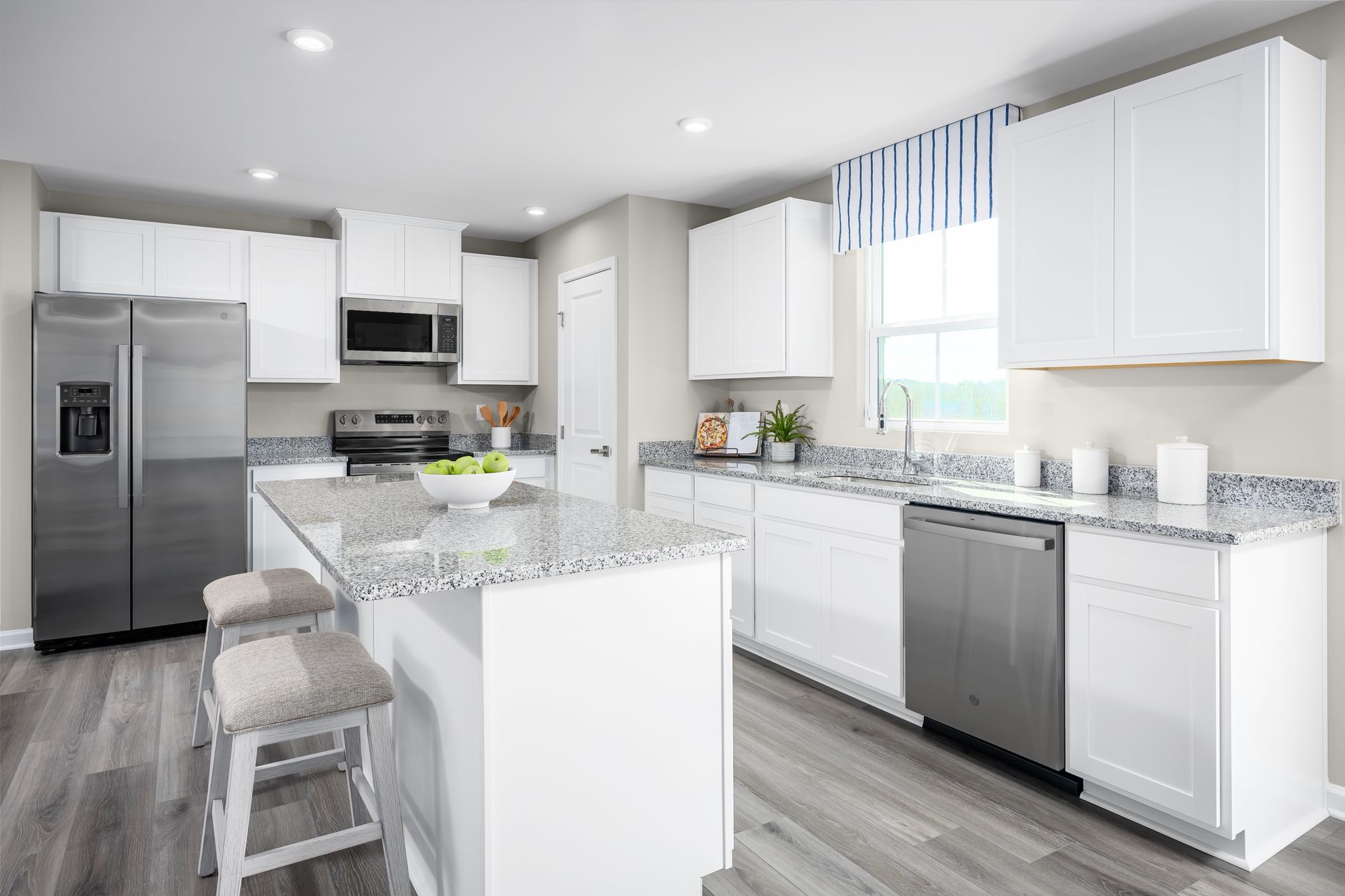 Your new kitchen comes with a refrigerator, dishwasher, microwave, and more included!?