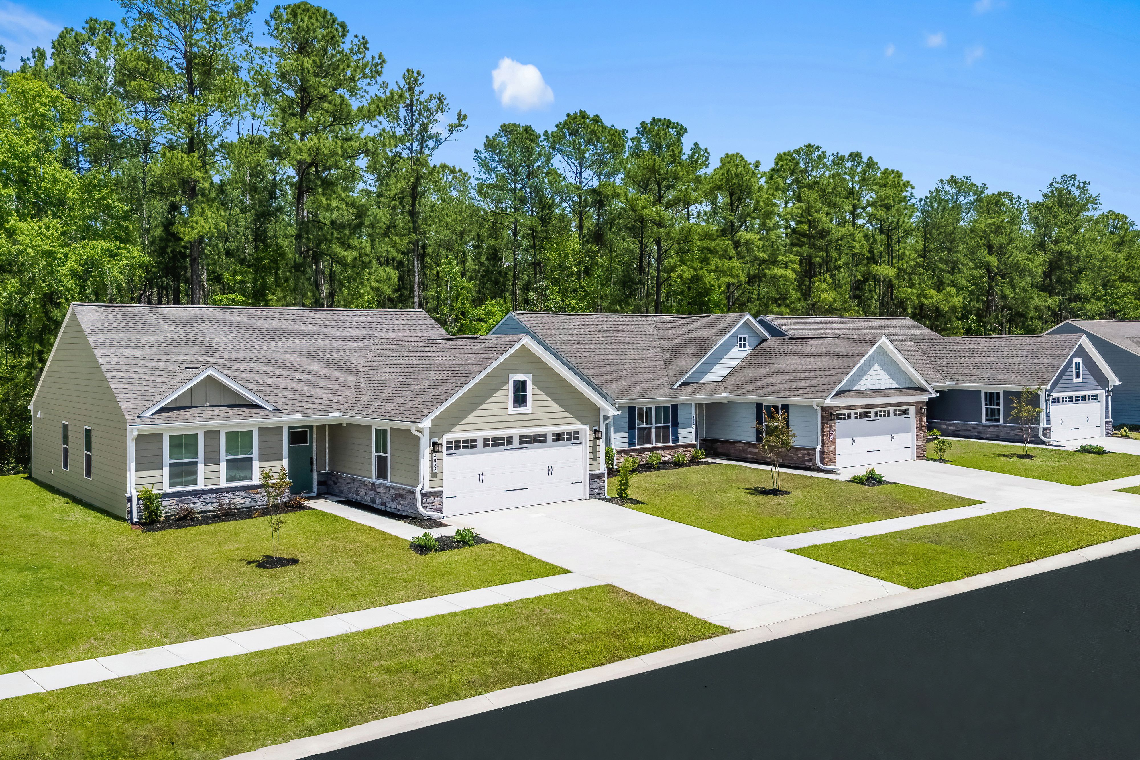 New home community privately tucked away by serene wooded surroundings – truly unique to this area.?