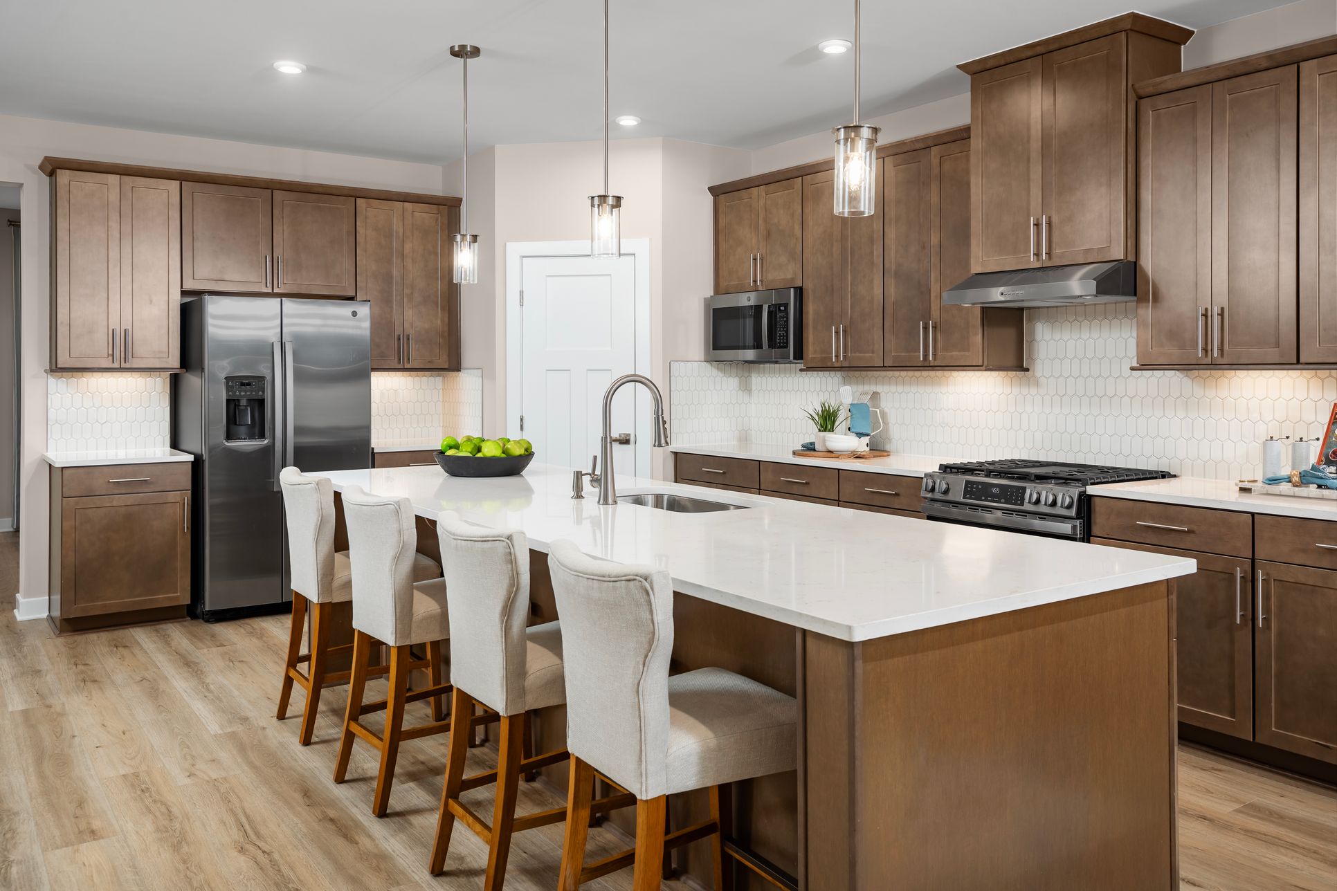 Cook in style with a spacious island and tons of cabinet space.