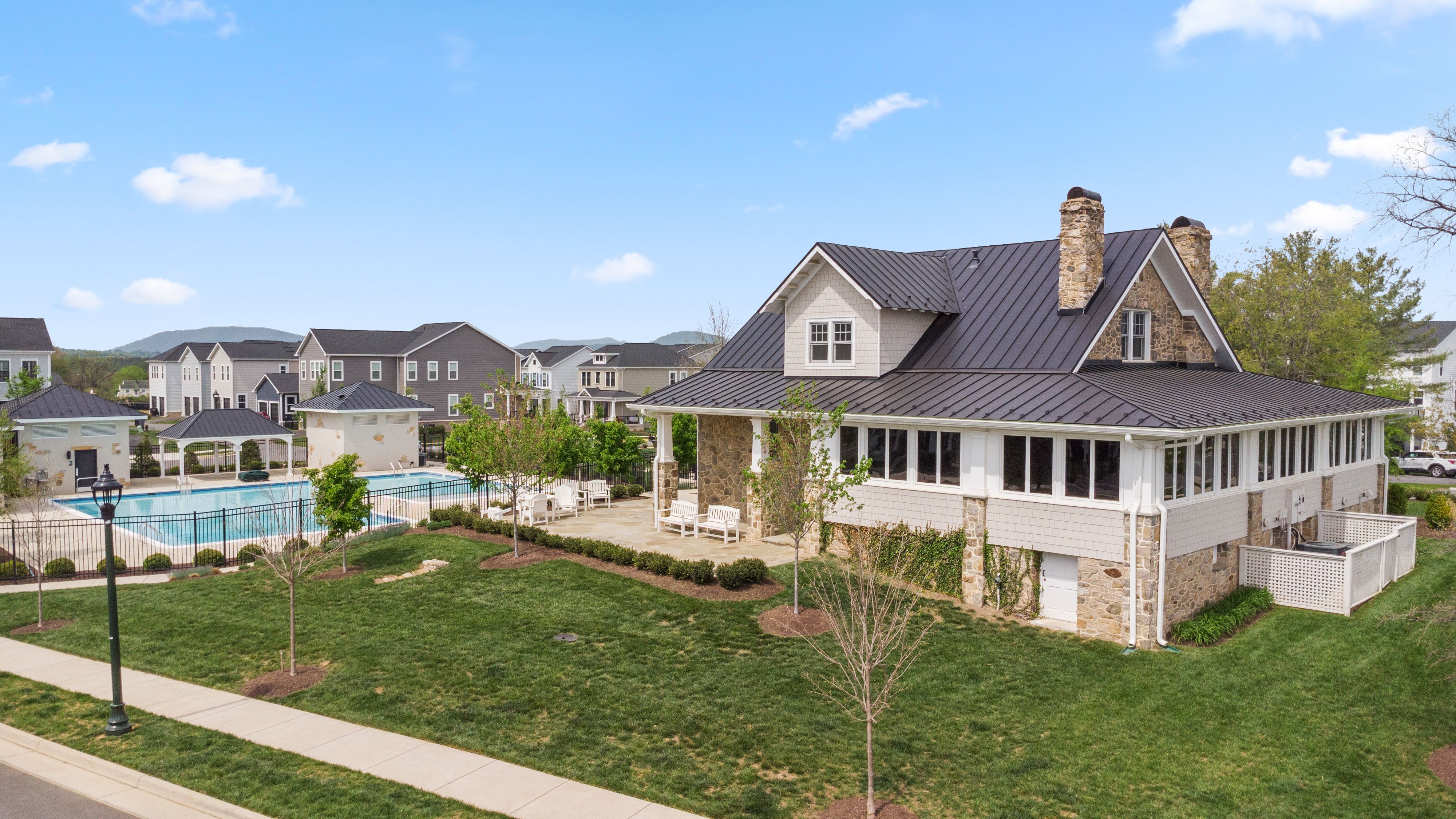 Enjoy an active lifestyle with trails, clubhouse, tot lots, pool, and gathering spaces.