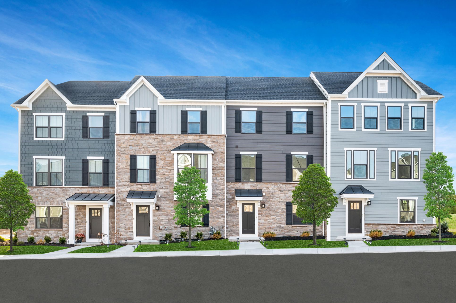 Stone accents, Hardie siding, and bronze windows create a truly elevated first impression.