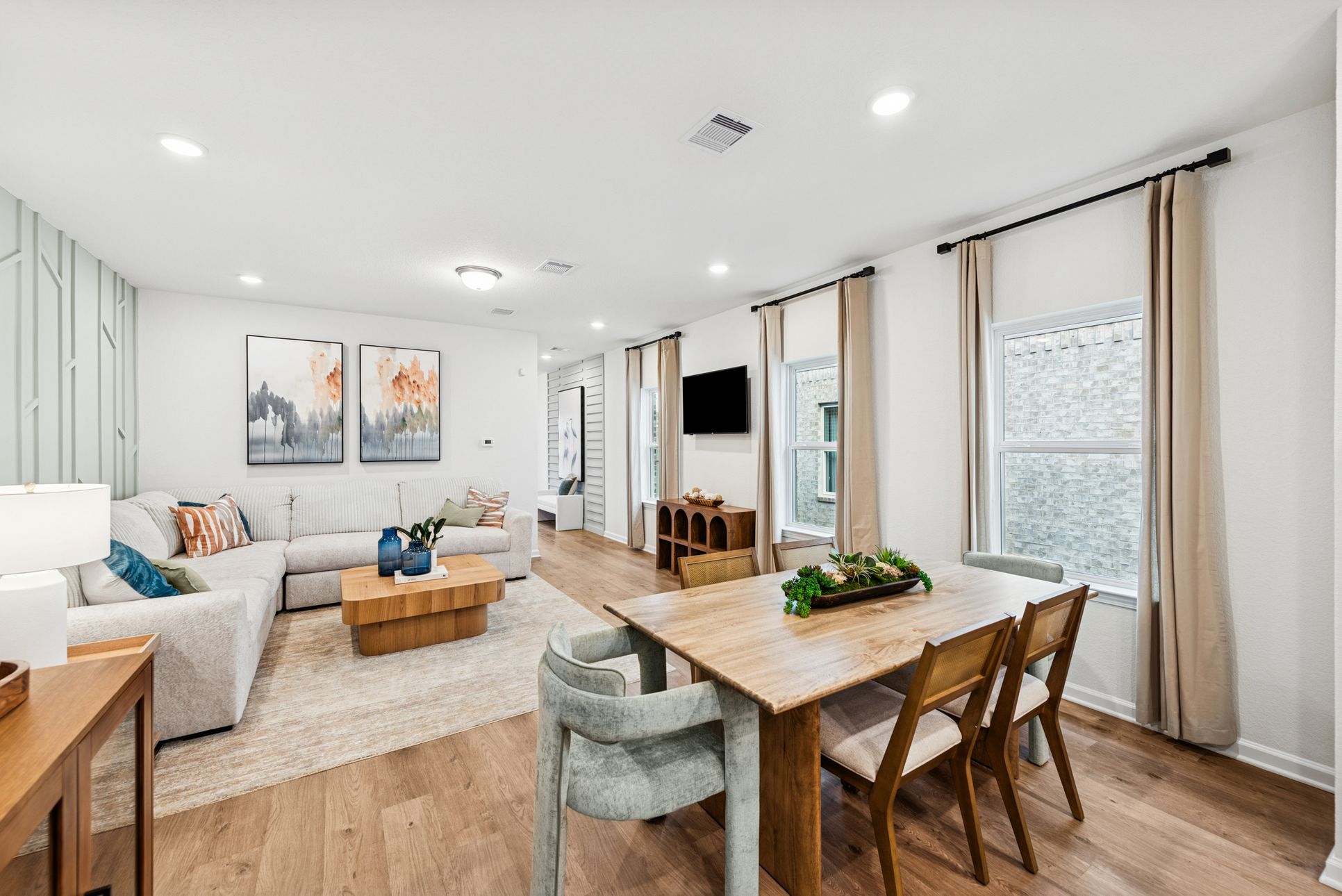 The Mockingbird II- Dining Area into Family Room:The Mockingbird II- Dining Area into Family Room