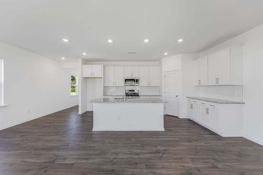 hj-nc-raleigh-magnolia-birch-lot-67-dining-area-to-kitchen-01