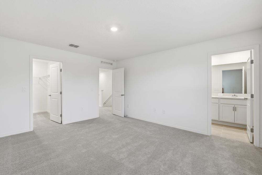 hj-fl-tampa-the-towns-at-firethorn-marigold-lot-1065-master-bedroom-003