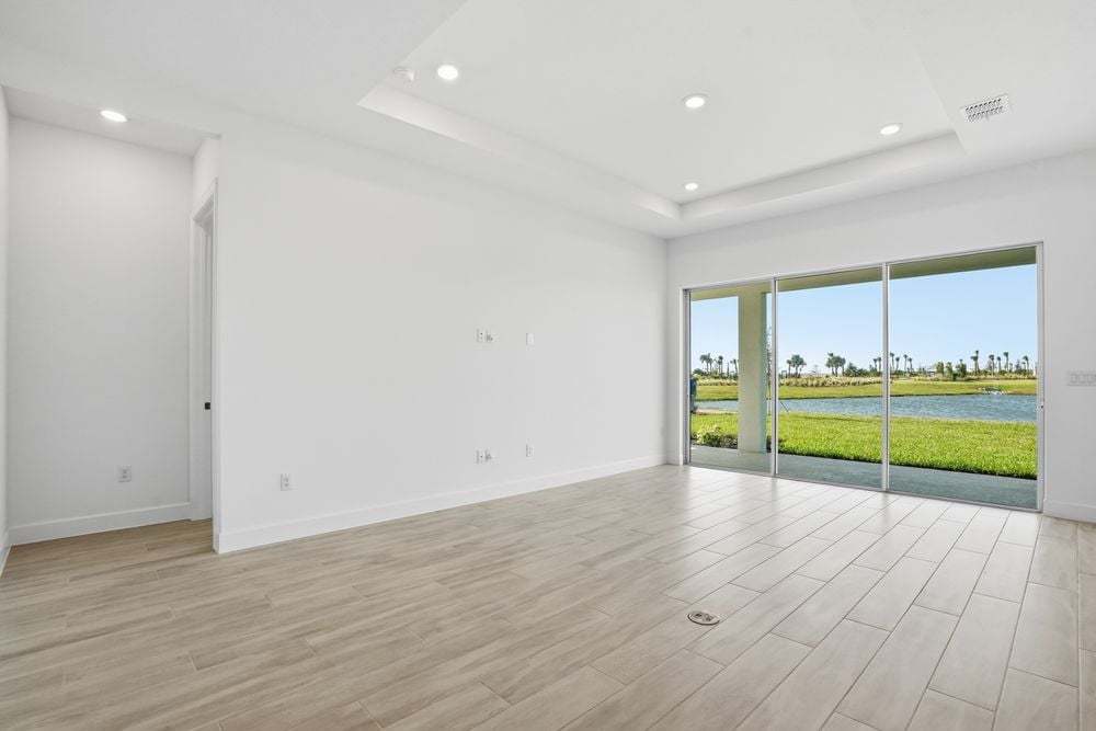 hj-fl-tampa-esplanade-at-coasterra-marino-lot-1003-tv-lounge-001