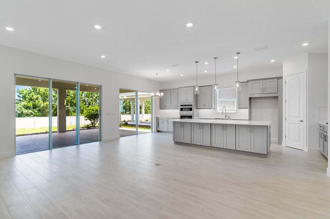 hj-fl-orlando-esplanade-at-center-lake-ranch-lazio-lot-3-tv-lounge-to-dining-area-01