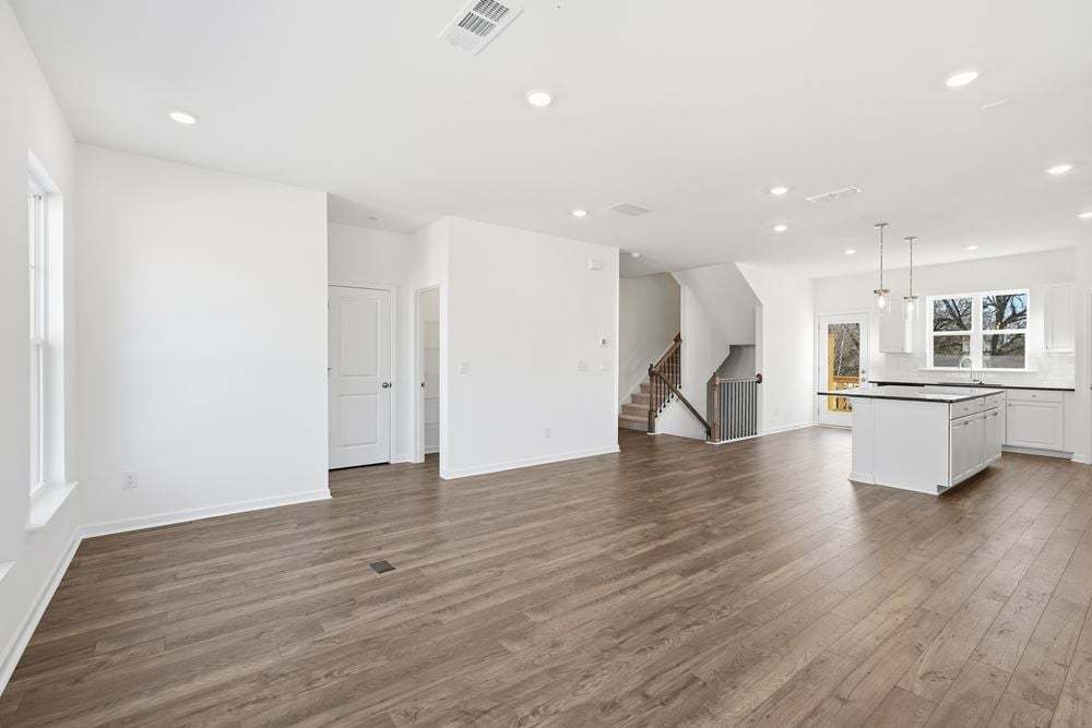 hj-ga-atlanta-somerset-at-veterans-memorial-forsyth-lot-13-tv-lounge-to-dining-area-001