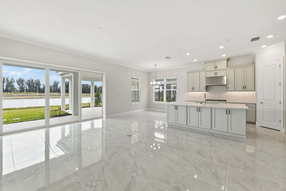 hj-fl-sarasota-esplanade-at-skye-ranch-farnese-lot-5113-tv-lounge-to-dining-area-001