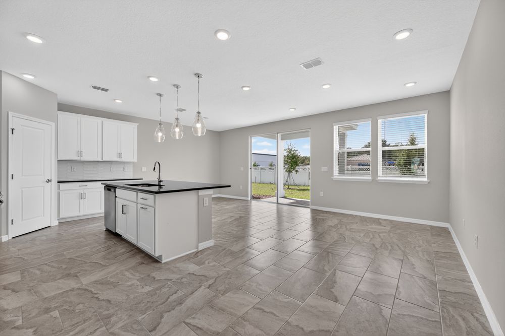 hj-fl-jacksonville-cherry-elm-at-silverLeaf-bellflower-lot-60-kitchen-to-tv-lounge-001