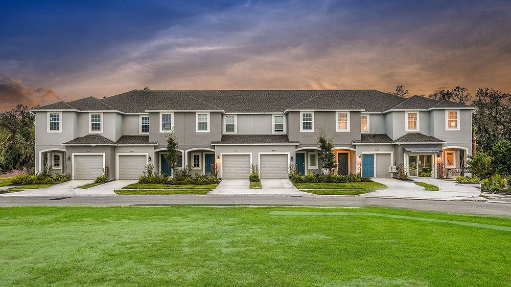 Townhomes-at-Skye-Ranch-Twilight-6122-1-16x9-ElevationTwilight