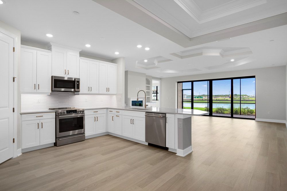 hjflFt myersnaplesesplanadebyislandscoachhomes15324lucernavitalelot102kitchentotvlounge001