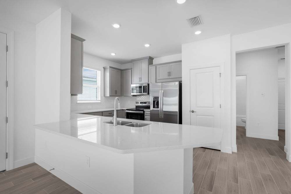 hj-fl-ft-myers-naples-cove-at-west-port-tobago-lot-130-kitchen-002