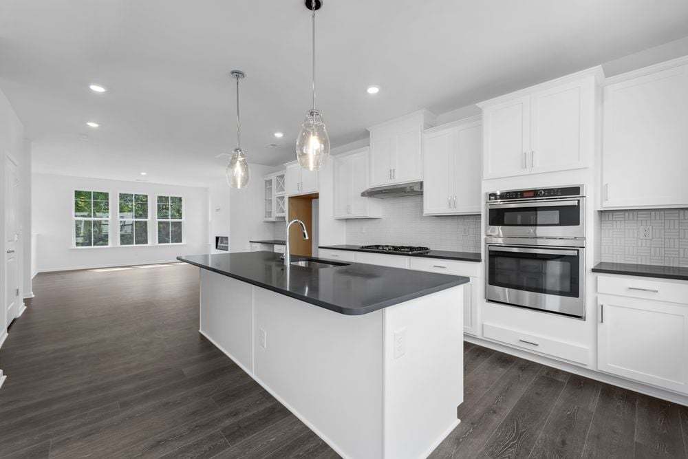 hj-nc-charlotte-parkside-commons-vail-II-lot-70-kitchen-to-tv-lounge-001