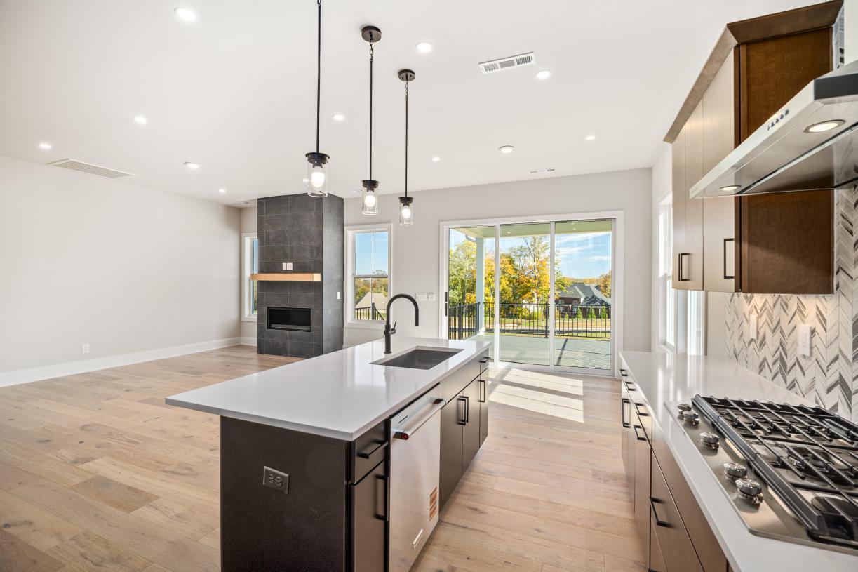 Elevation Image:Stunning kitchen with casual dining area that leads out to covered deck
