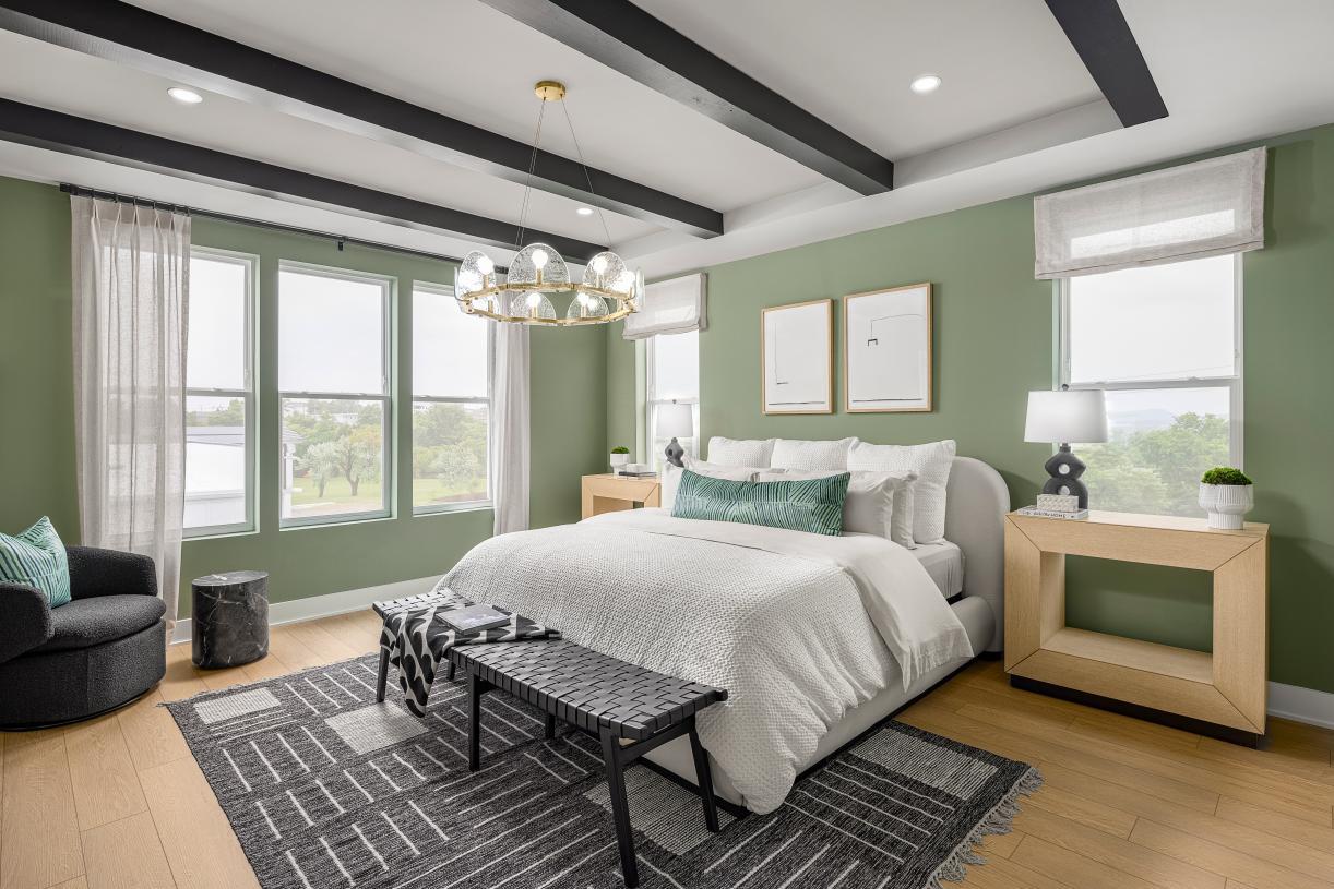 Elevation Image:Serene primary bedroom suites boast a large walk-in closet and spa-like bathroom
