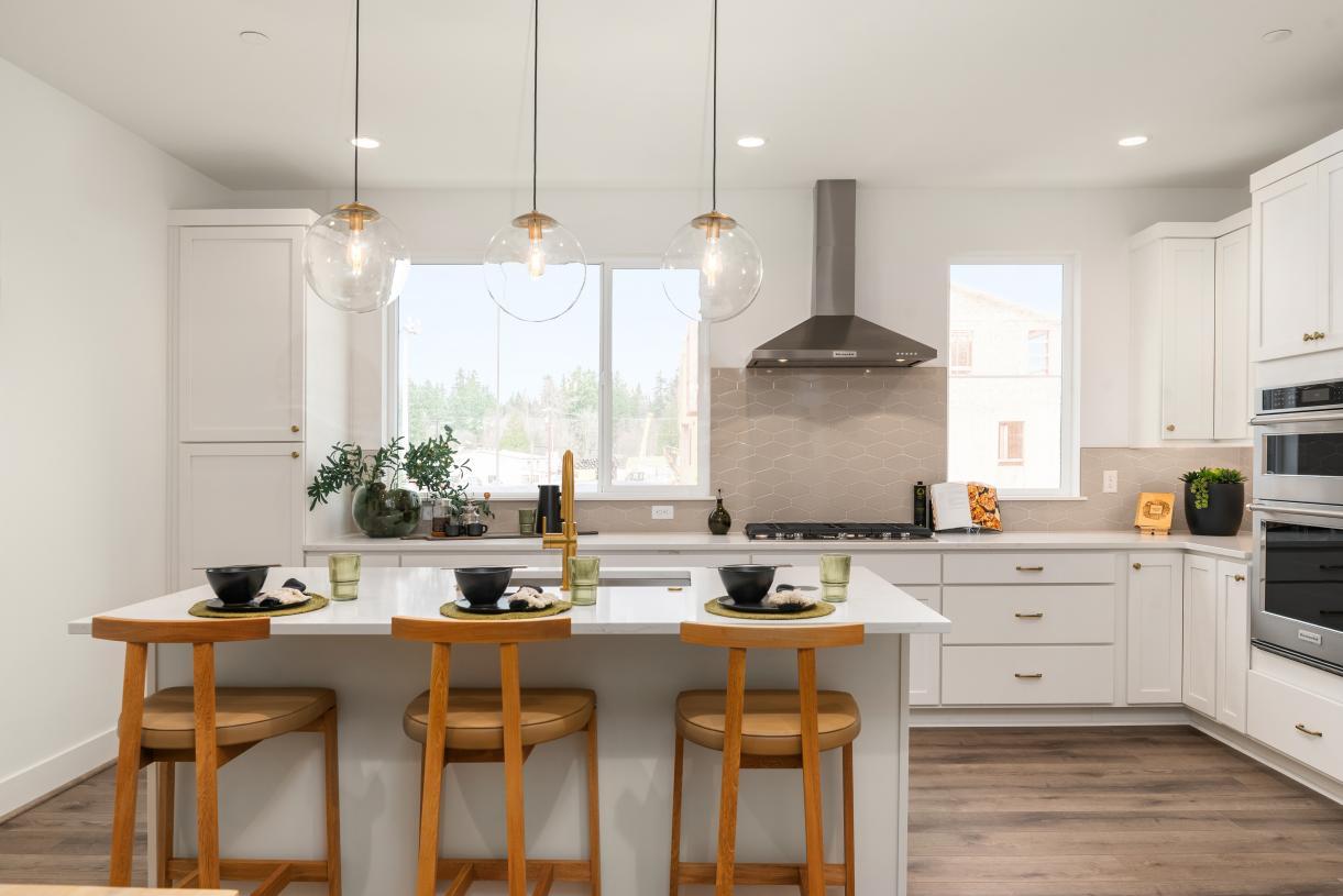 Elevation Image:Kitchen features white shaker style cabinetry