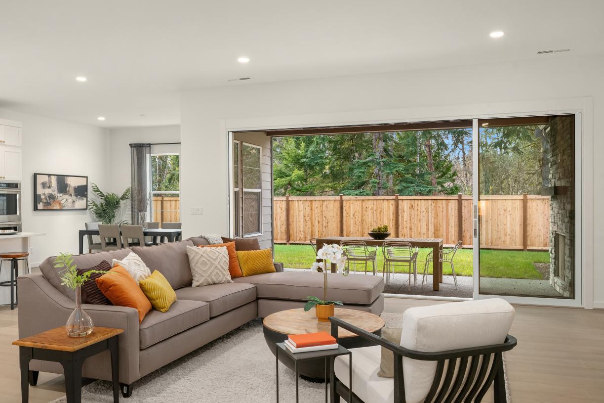 Elevation Image:Great room with expansive stacking glass doors to covered patio