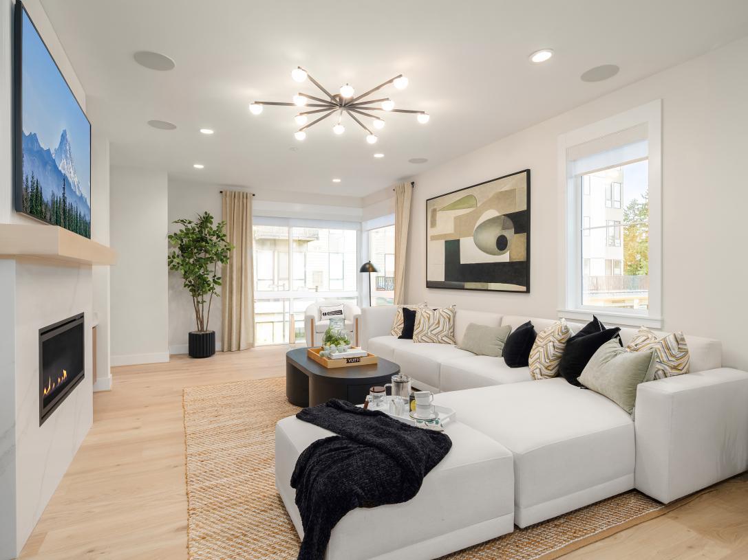 Elevation Image:Spacious great room features floor-to-ceiling corner windows