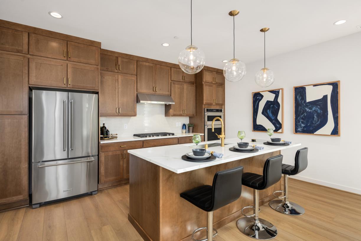 Elevation Image:Kitchen features stained shaker cabinetry
