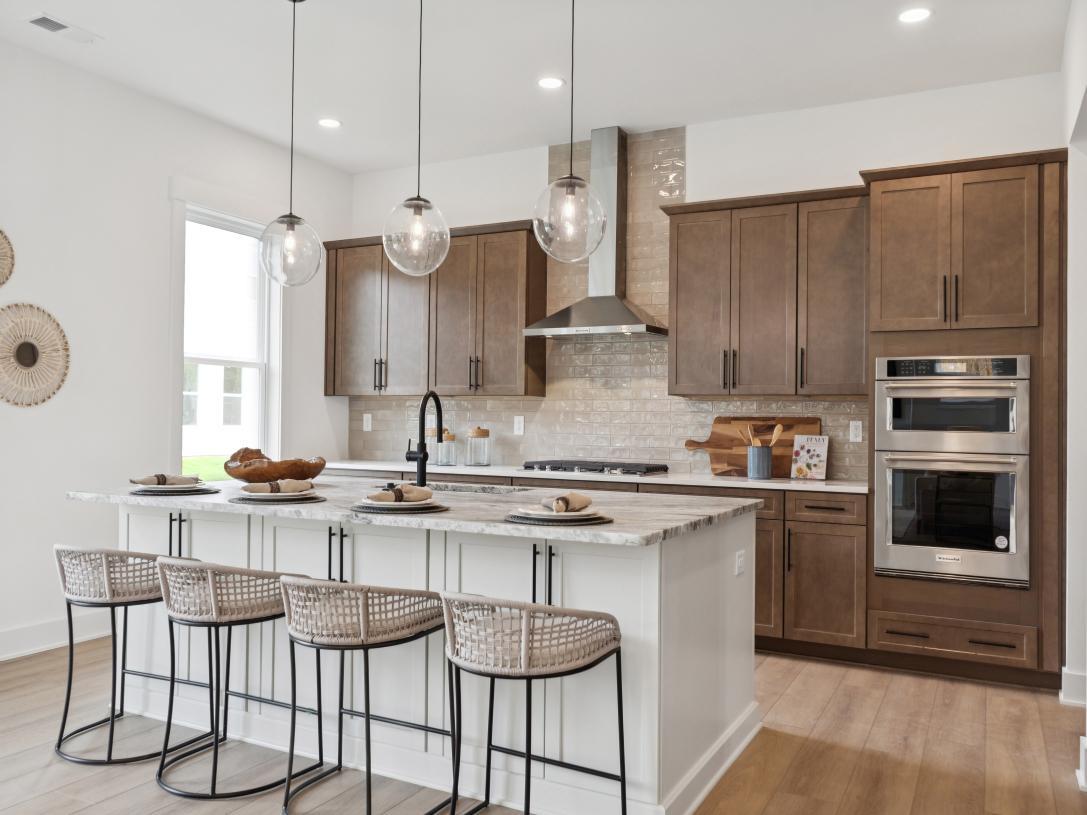 Elevation Image:Well thought out kitchen with two-toned cabinets