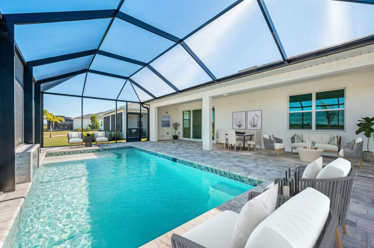 Elevation Image:Enjoy the Florida sun in your spa-like pool with a spacious covered lanai