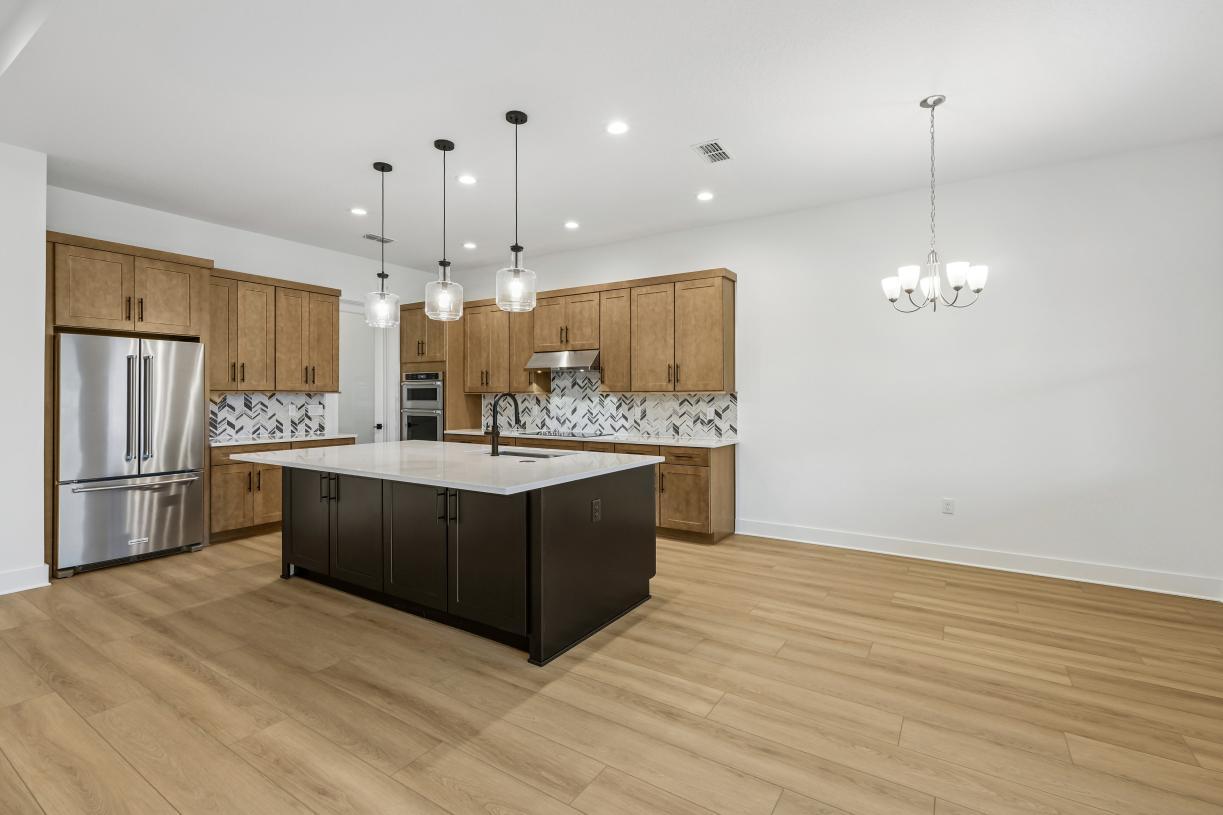 Elevation Image:Gather round, entertain, and relax in a grand, light-filled space designed for connection