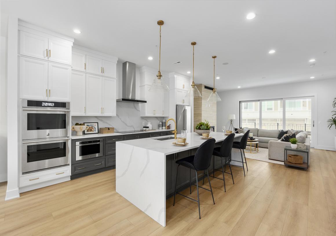 Elevation Image:Gourmet kitchen boasts a large center island