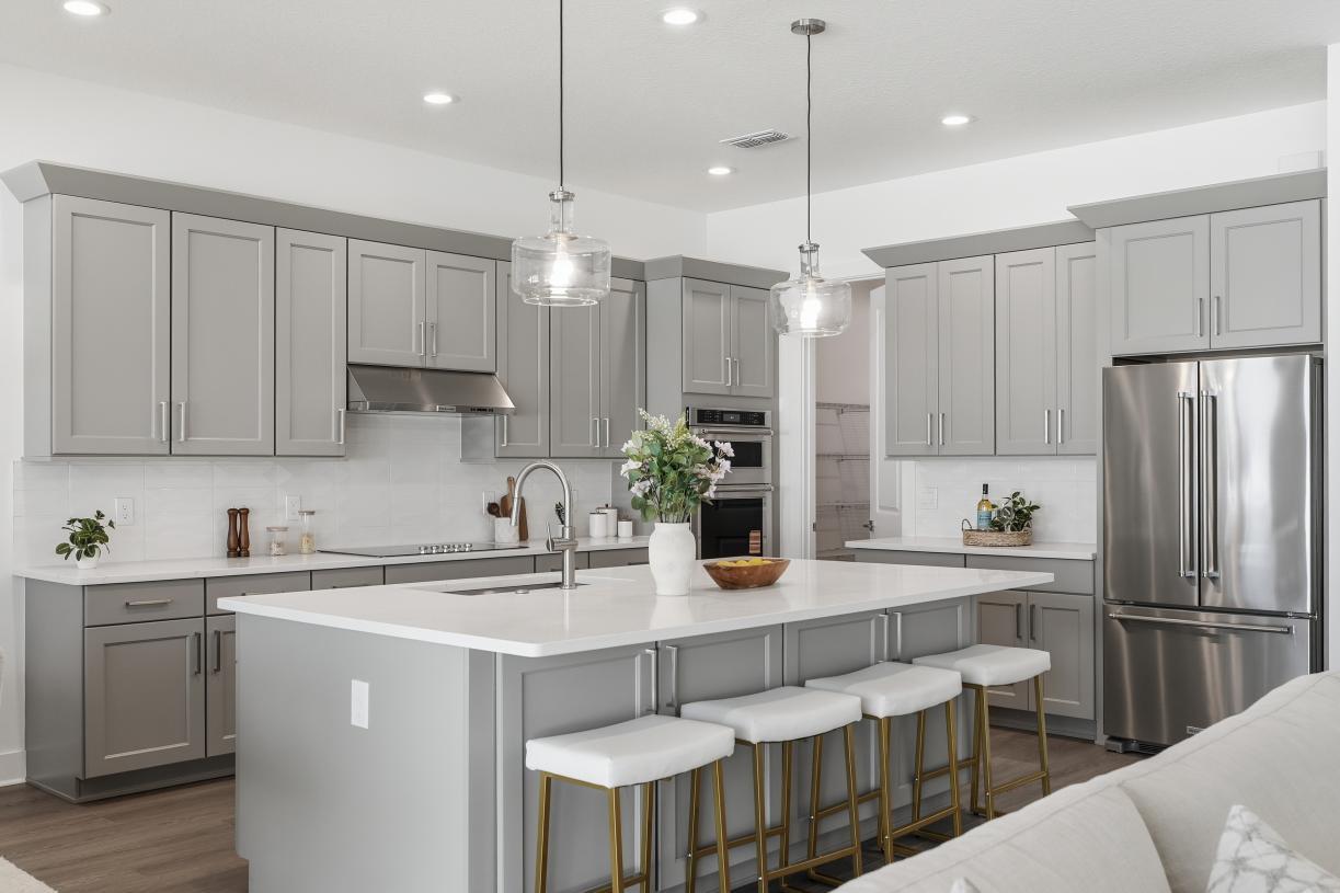 Elevation Image:Thoughtfully designed kitchen with expansive counter space and styled finishes