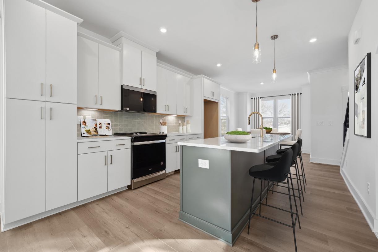 Elevation Image:Spacious kitchen with two-toned cabinets