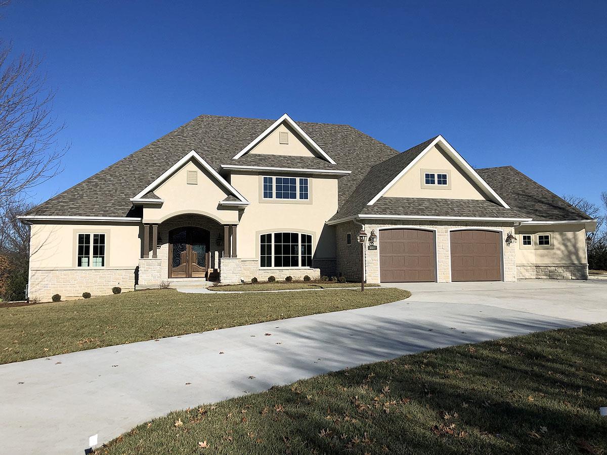 Tompkins Custom Homes,65203