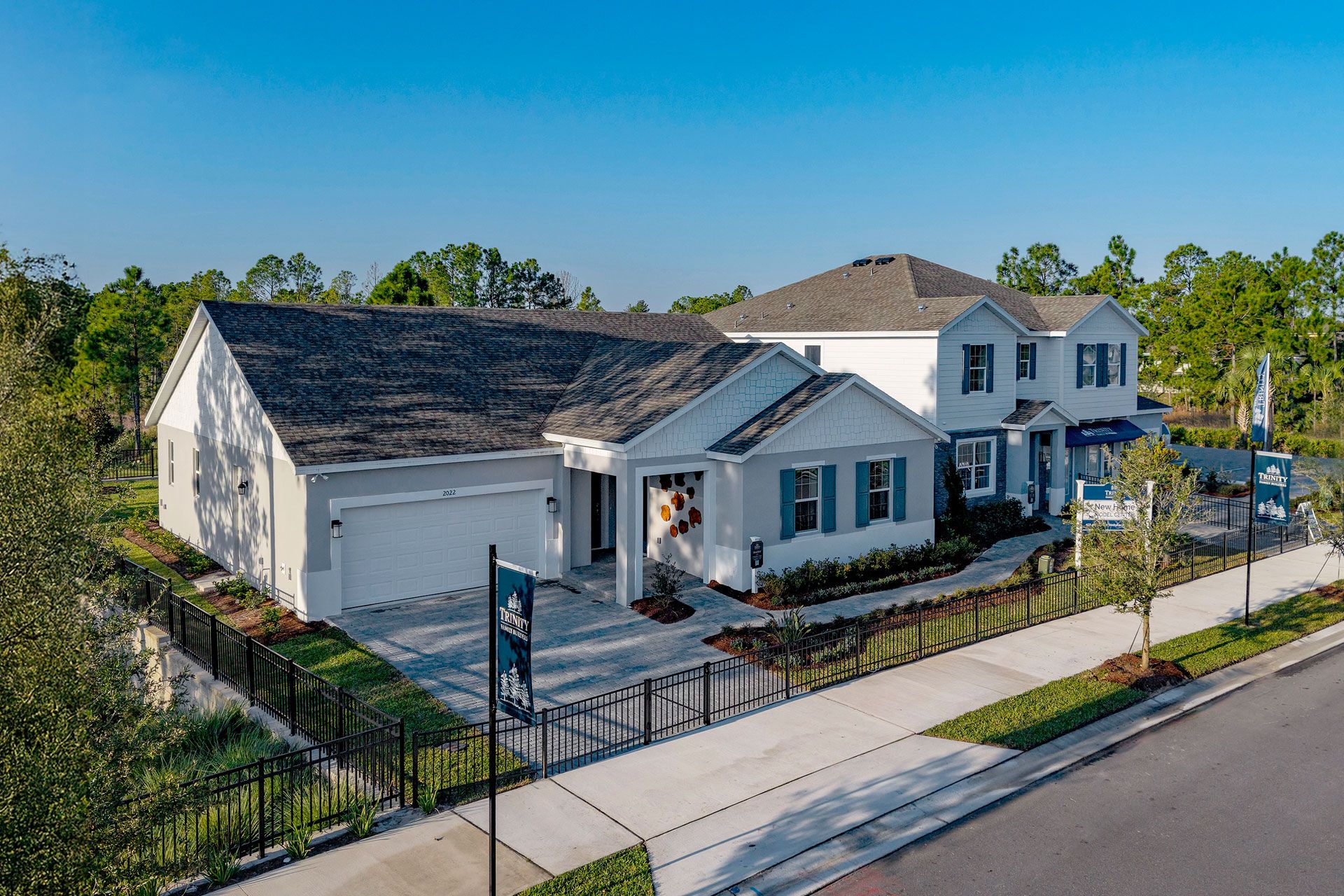 New homes in Trinity Gardens featuring model homes, future resort pool, dog park, and trails.:Trinity Gardens in DeLand, FL New Home Community Surrounded by Nature