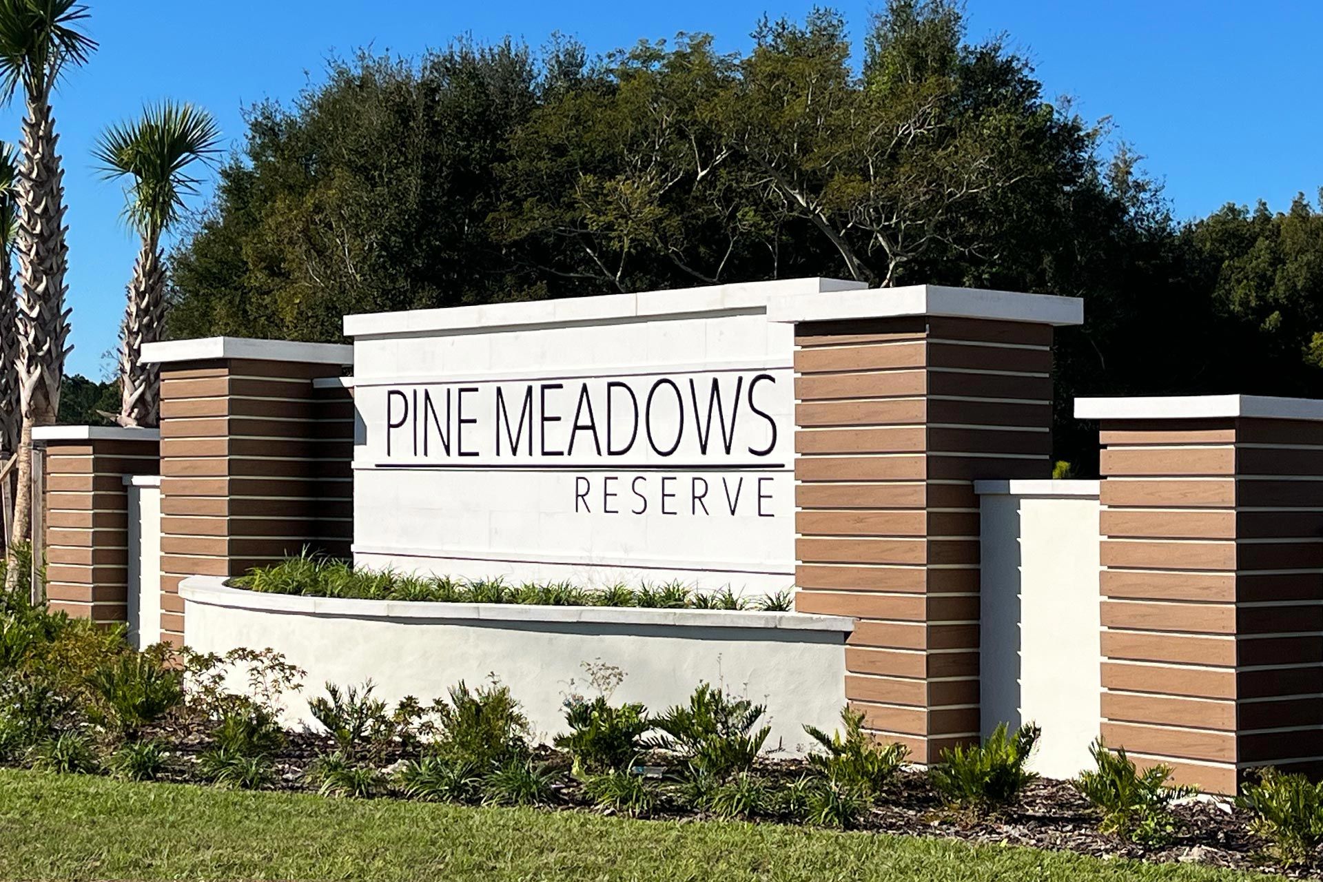 1-pine-meadows-entrance-monument.jpg:1-pine-meadows-entrance-monument.jpg