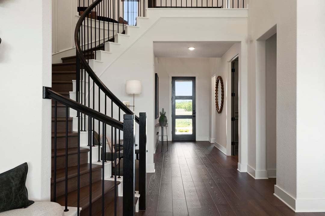 McKinney Home Design:Foyer and Curved Staircase