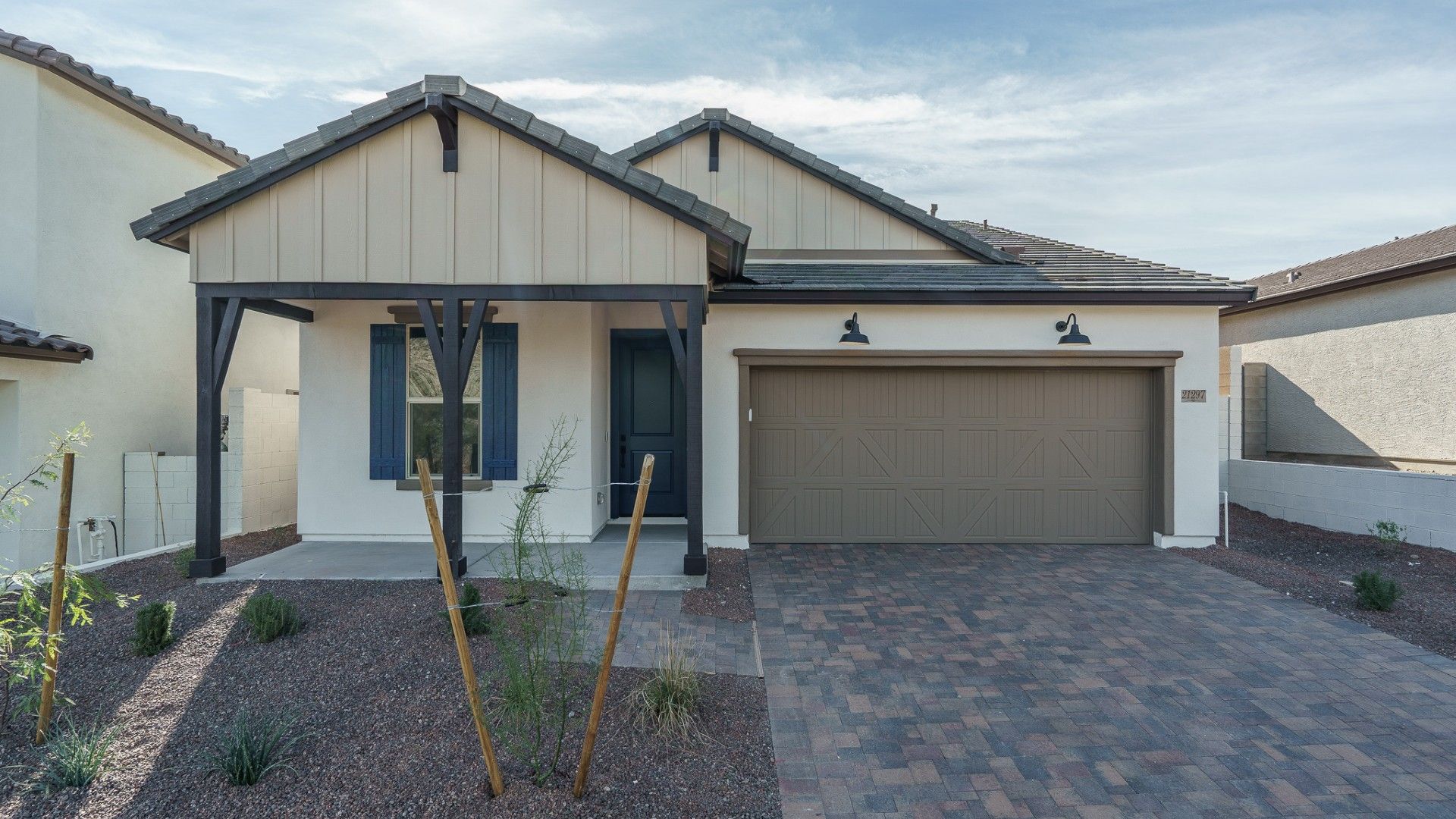 The Ridge at Sienna Hills - Saguaro Floor Plan - Front Exterior:saguaro farmhouse new homes for sale the ridge at sienna hills buckeye az william ryan