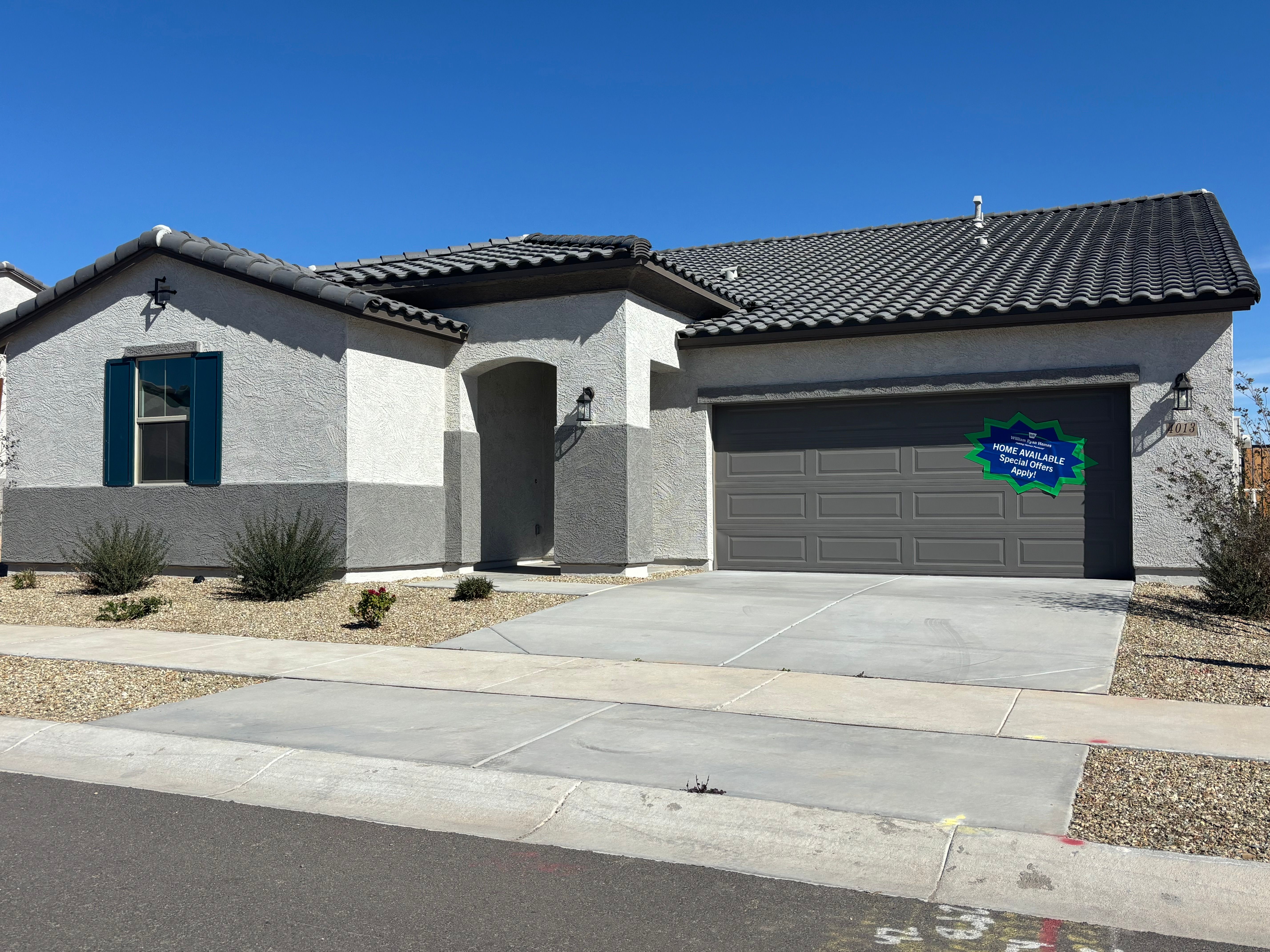 The Grove at El Cidro - Juniper Floor Plan - Front Exterior Spanish Elevation:juniper floor plan new homes for sale the grove at el cidro goodyear az william ryan