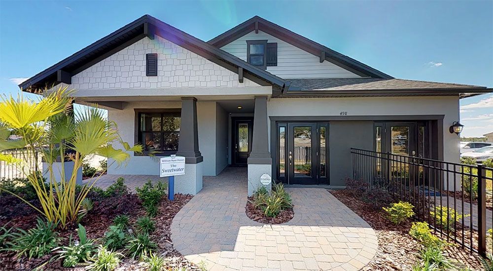 Sweetwater model home front exterior Hawthorn at the Villages of Avalon Spring Hill FL William Ry...