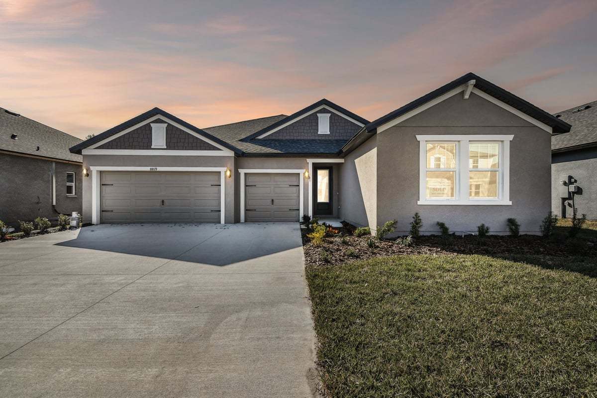 Captiva New Home Plan Craftsman Front View at Dusk:Captiva new construction home plan craftsman elevation by William Ryan Homes Tampa